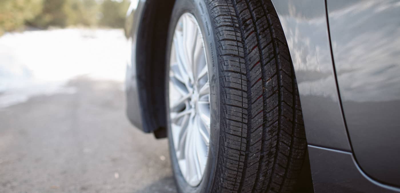 Tire on Car Winter Road Image